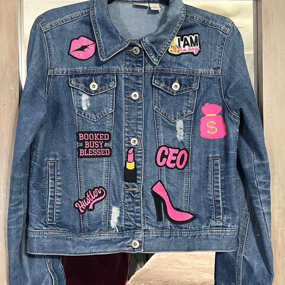Denim Jacket with machine sewed patches.